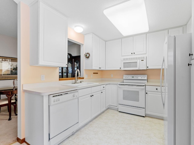 9323 Kimberly Ln N, Maple Grove, MN 55311 - kitchen with white appliances, light countertops, white cabinetry, and light floors