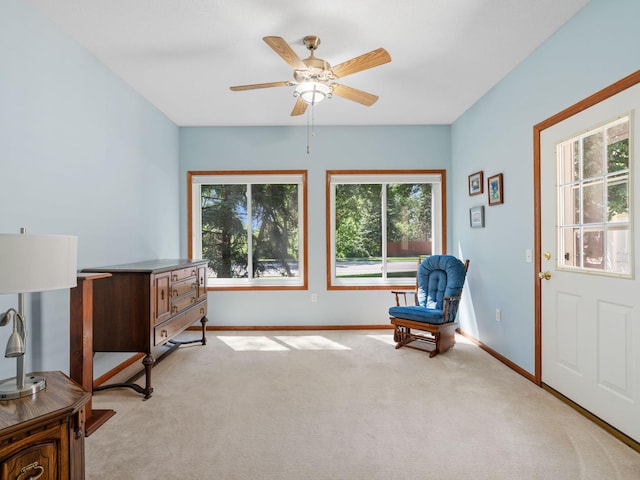 9323 Kimberly Ln N, Maple Grove, MN 55311 - living area with ceiling fan and light carpet