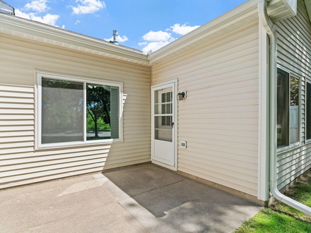 9323 Kimberly Ln N, Maple Grove, MN 55311 - doorway to property with a patio
