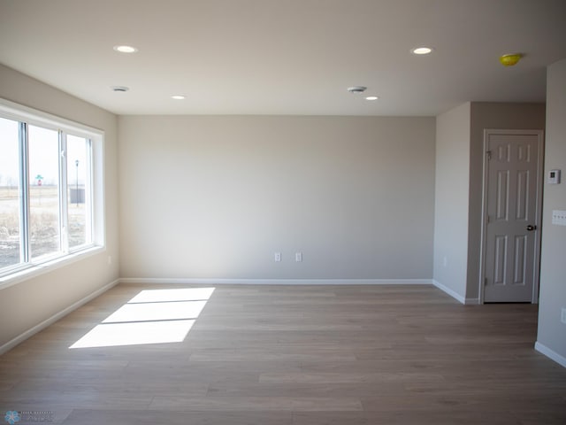 861 2nd Ave, Horace, ND 58047 - empty room featuring light wood finished floors, baseboards, and recessed lighting