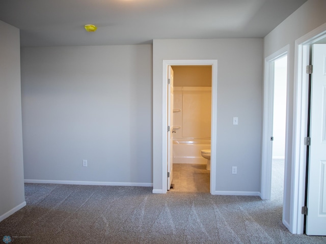 861 2nd Ave, Horace, ND 58047 - unfurnished bedroom with carpet and baseboards