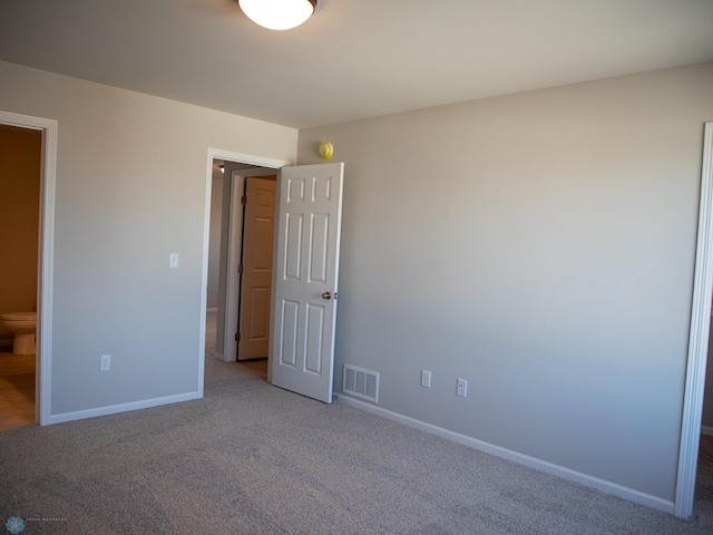 861 2nd Ave, Horace, ND 58047 - unfurnished bedroom with carpet, baseboards, and ensuite bath
