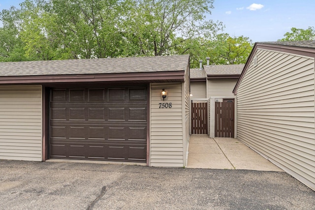 7508 Germane Trl Unit 0, Apple Valley, MN 55124 - garage with fence and a gate