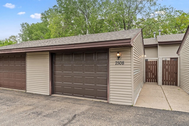 7508 Germane Trl Unit 0, Apple Valley, MN 55124 - garage featuring fence