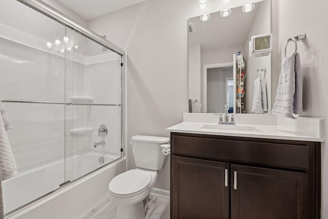 2422 Blossom Cir, Orono, MN 55356 - full bathroom with vanity, toilet, bath / shower combo with glass door, and baseboards