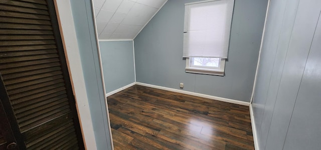 612 Mcpherson St, Littlefork, MN 56653 - bonus room featuring dark wood-style flooring, baseboards, and vaulted ceiling