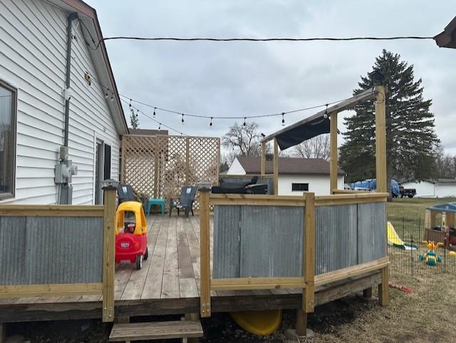 exterior space featuring a wooden deck