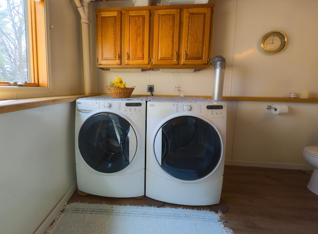 45257 Jack Pine Dr, Perham Twp, MN 56573 - laundry room featuring washing machine and dryer, wood finished floors, and baseboards