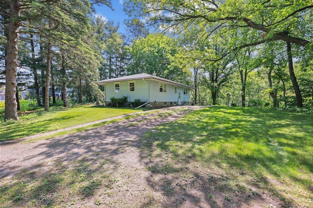 15881 Rush Creek Rd, Dayton, MN 55369 - view of property exterior with a lawn