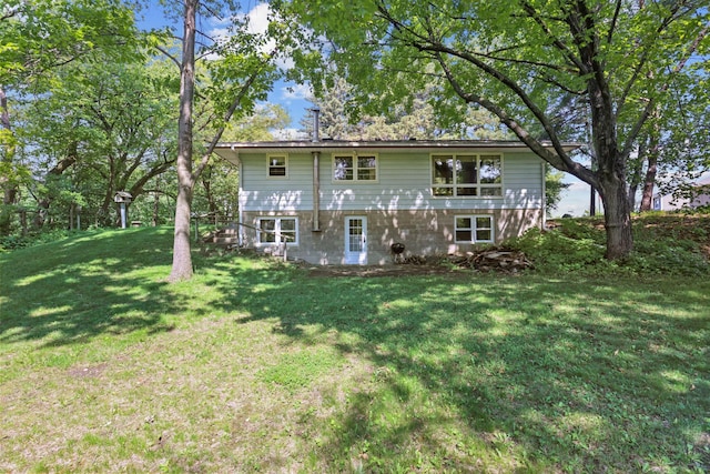 15881 Rush Creek Rd, Dayton, MN 55369 - back of property featuring a yard