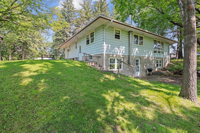 15881 Rush Creek Rd, Dayton, MN 55369 - view of home's exterior with a lawn