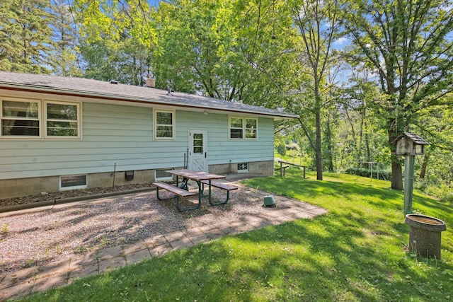 15881 Rush Creek Rd, Dayton, MN 55369 - rear view of house with a yard and a patio