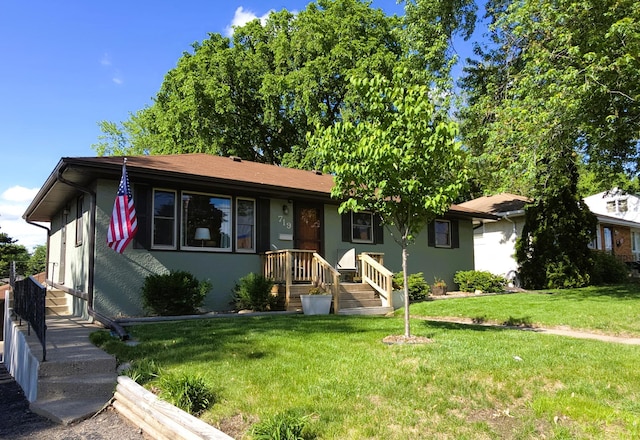 719 49th Ave NE, Columbia Heights, MN 55421 - ranch-style home featuring a front lawn and stucco siding