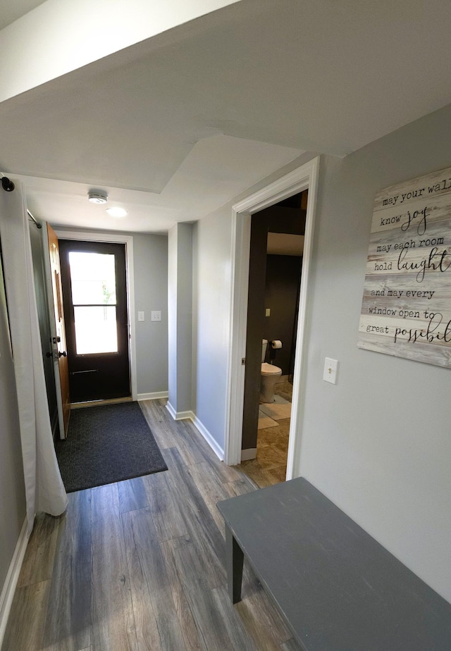 719 49th Ave NE, Columbia Heights, MN 55421 - foyer entrance with dark wood-style flooring and baseboards