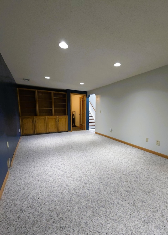 719 49th Ave NE, Columbia Heights, MN 55421 - carpeted empty room featuring stairway, baseboards, and recessed lighting