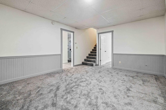 14347 Memorywood Dr, Baxter, MN 56425 - spare room featuring stairway, a wainscoted wall, carpet, and a drop ceiling