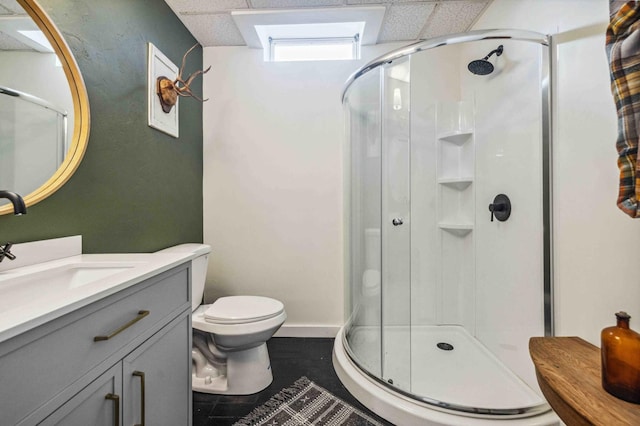 14347 Memorywood Dr, Baxter, MN 56425 - bathroom featuring a shower stall, toilet, vanity, and a paneled ceiling