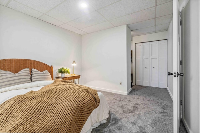 14347 Memorywood Dr, Baxter, MN 56425 - bedroom featuring baseboards, carpet floors, a closet, and a paneled ceiling