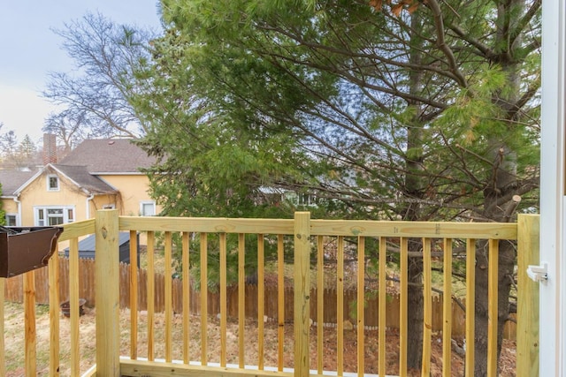 view of gate with fence