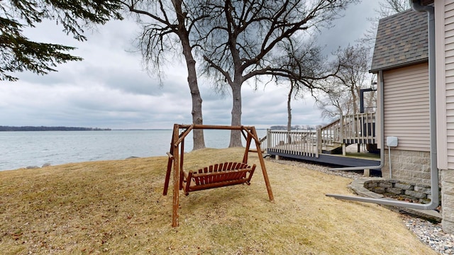 7030 147th Ave SE, Lake Lillian, MN 56253 - view of grassy yard featuring a deck with water view
