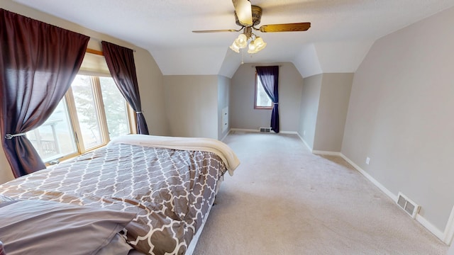 7030 147th Ave SE, Lake Lillian, MN 56253 - carpeted bedroom featuring baseboards, vaulted ceiling, and a ceiling fan