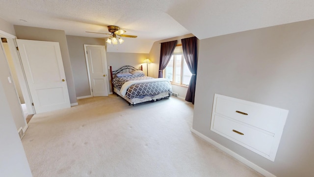 7030 147th Ave SE, Lake Lillian, MN 56253 - bedroom featuring light colored carpet, baseboards, ceiling fan, and a textured ceiling