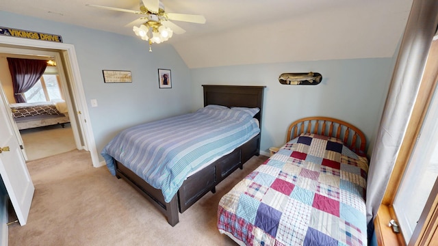 7030 147th Ave SE, Lake Lillian, MN 56253 - bedroom with light carpet, vaulted ceiling, a ceiling fan, and baseboards