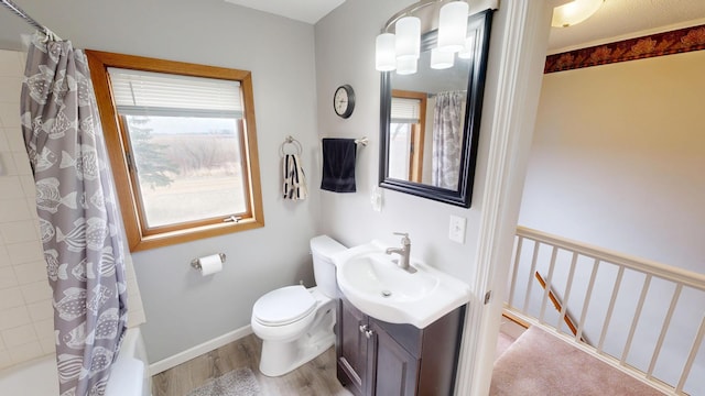 7030 147th Ave SE, Lake Lillian, MN 56253 - full bathroom featuring healthy amount of natural light, wood finished floors, toilet, and vanity