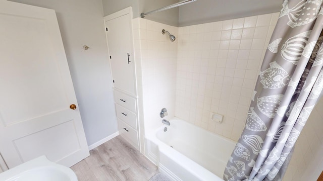 7030 147th Ave SE, Lake Lillian, MN 56253 - bathroom featuring wood finished floors and shower / bath combination with curtain