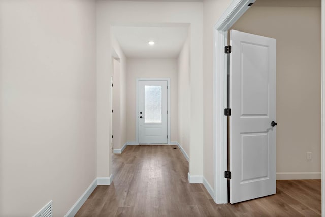 18761 Grant St NW, Elk River, MN 55330 - hallway featuring wood finished floors