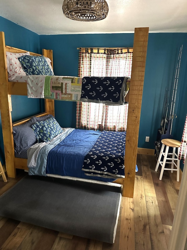 bedroom featuring hardwood / wood-style floors