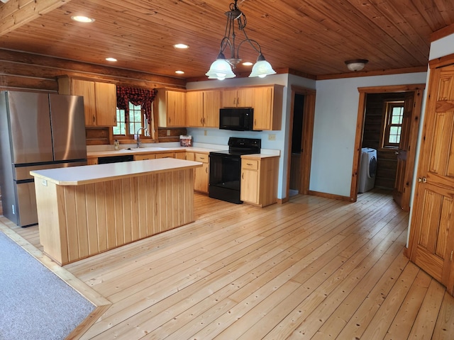 21339 Finch Dr, Park Rapids, MN 56470 - kitchen with black appliances, wooden ceiling, washer / clothes dryer, light countertops, and a kitchen island