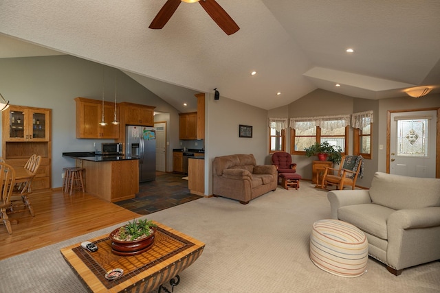 3195 115th St NW, Oronoco, MN 55960 - living room featuring lofted ceiling, a ceiling fan, recessed lighting, and dark wood-style floors
