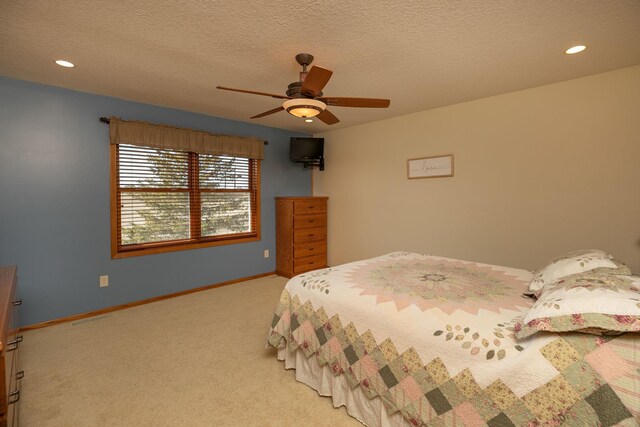 3195 115th St NW, Oronoco, MN 55960 - bedroom with carpet floors, baseboards, ceiling fan, recessed lighting, and a textured ceiling