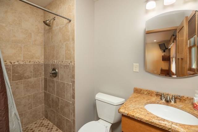 3195 115th St NW, Oronoco, MN 55960 - bathroom with tiled shower, vanity, and toilet