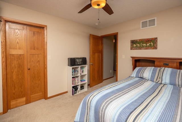 3195 115th St NW, Oronoco, MN 55960 - bedroom with light carpet, baseboards, and a ceiling fan
