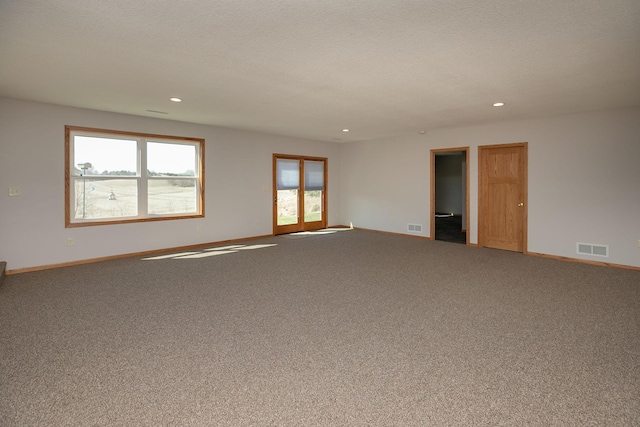 3195 115th St NW, Oronoco, MN 55960 - carpeted spare room with baseboards and recessed lighting