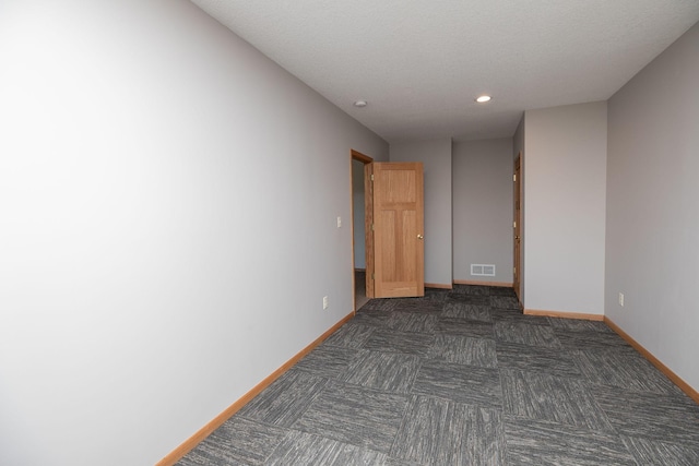 3195 115th St NW, Oronoco, MN 55960 - unfurnished room with baseboards and recessed lighting