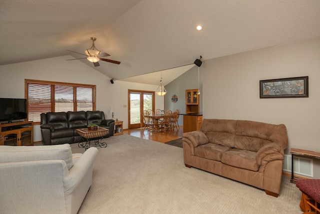 3195 115th St NW, Oronoco, MN 55960 - living area with vaulted ceiling, ceiling fan, carpet floors, and recessed lighting