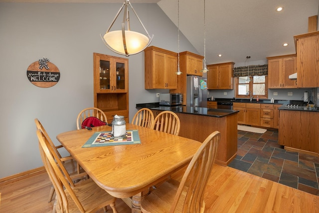 3195 115th St NW, Oronoco, MN 55960 - dining room featuring recessed lighting, high vaulted ceiling, and baseboards