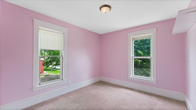 723 3rd St SW, Willmar, MN 56201 - unfurnished room featuring carpet flooring and baseboards