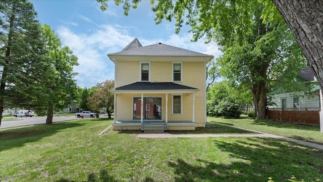723 3rd St SW, Willmar, MN 56201 - american foursquare style home with a porch