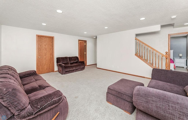 3358 70th Ave N, Moorhead, MN 56560 - carpeted living area with recessed lighting, a textured ceiling, stairway, and baseboards