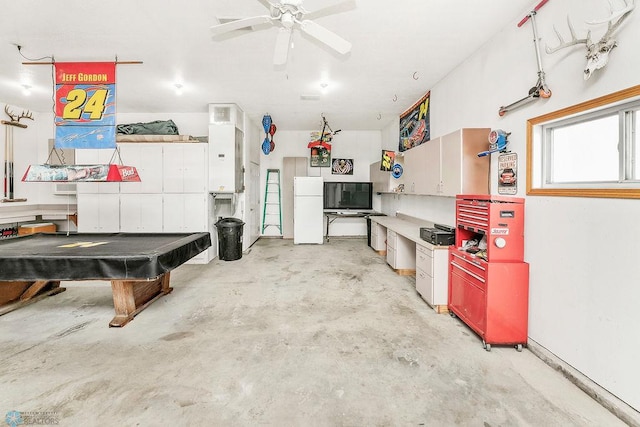 3358 70th Ave N, Moorhead, MN 56560 - garage featuring freestanding refrigerator and ceiling fan