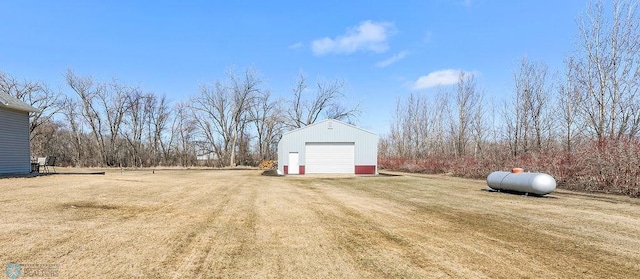 3358 70th Ave N, Moorhead, MN 56560 - view of green lawn featuring an outbuilding and a detached garage