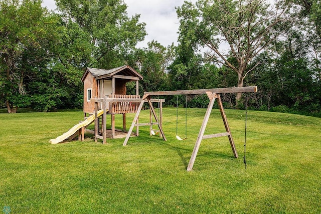 3358 70th Ave N, Moorhead, MN 56560 - view of play area featuring a lawn and view of wooded area