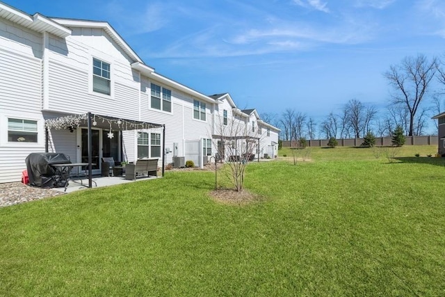 back of property featuring central AC, a pergola, a patio, and a lawn
