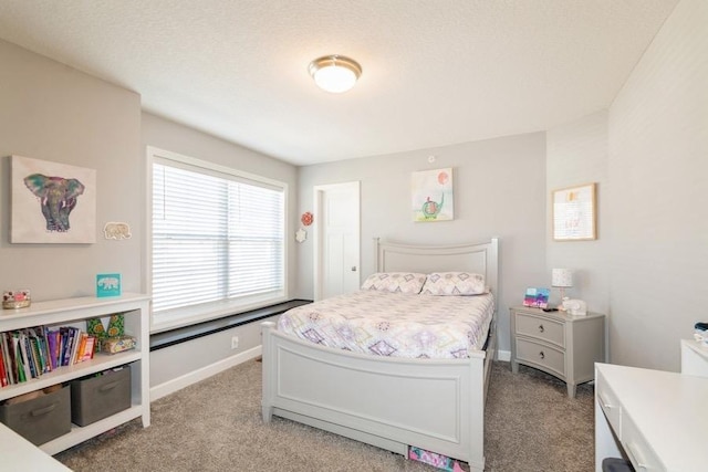 bedroom with light carpet and baseboards