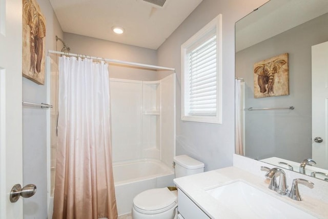 full bathroom with toilet, vanity, shower / tub combo with curtain, and recessed lighting