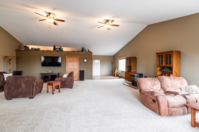 34506 Pleasant Point Dr, Homer Twp, MN 55987 - living area featuring ceiling fan, a wood stove, carpet floors, and high vaulted ceiling